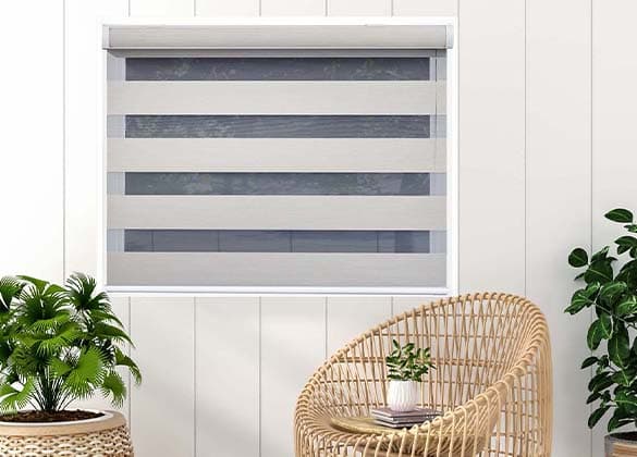 Zebra blinds shown in a furnished room